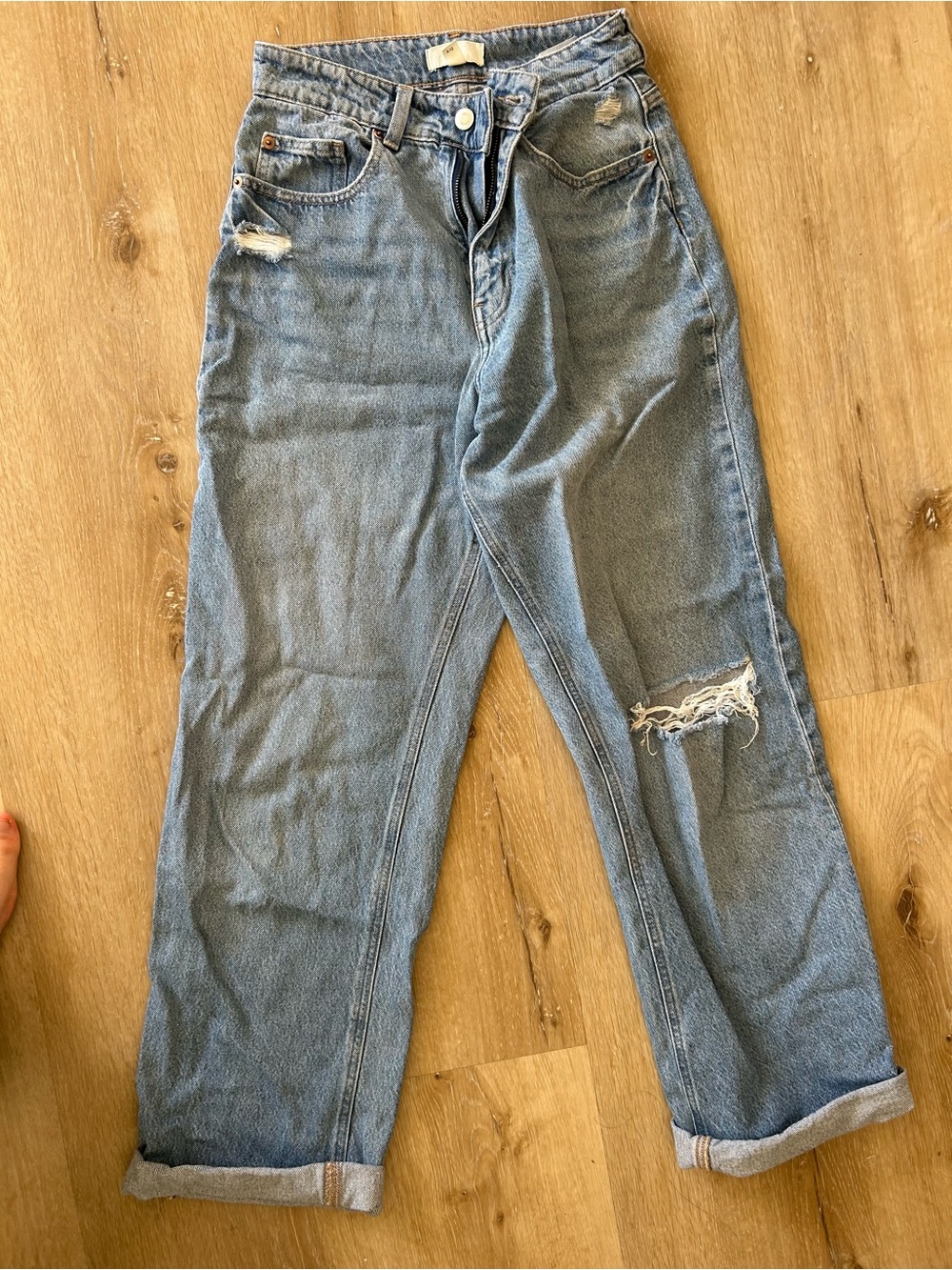 High-Rise Light Blue Distressed Jeans